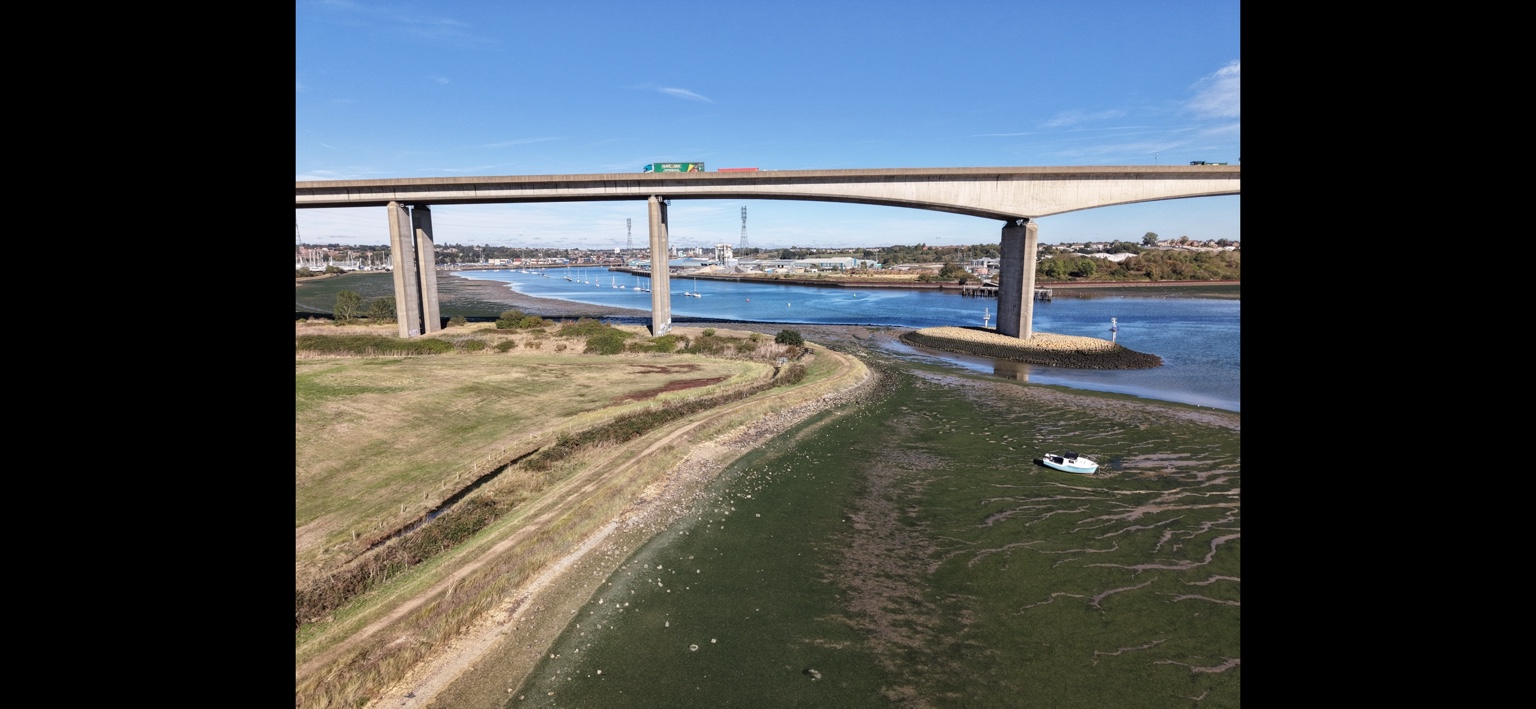 The Orwell Bridge and riverbanks looking towards Ipswich